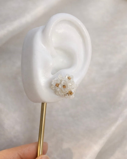white seashell flowers pierce