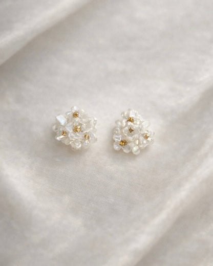 white seashell flowers pierce
