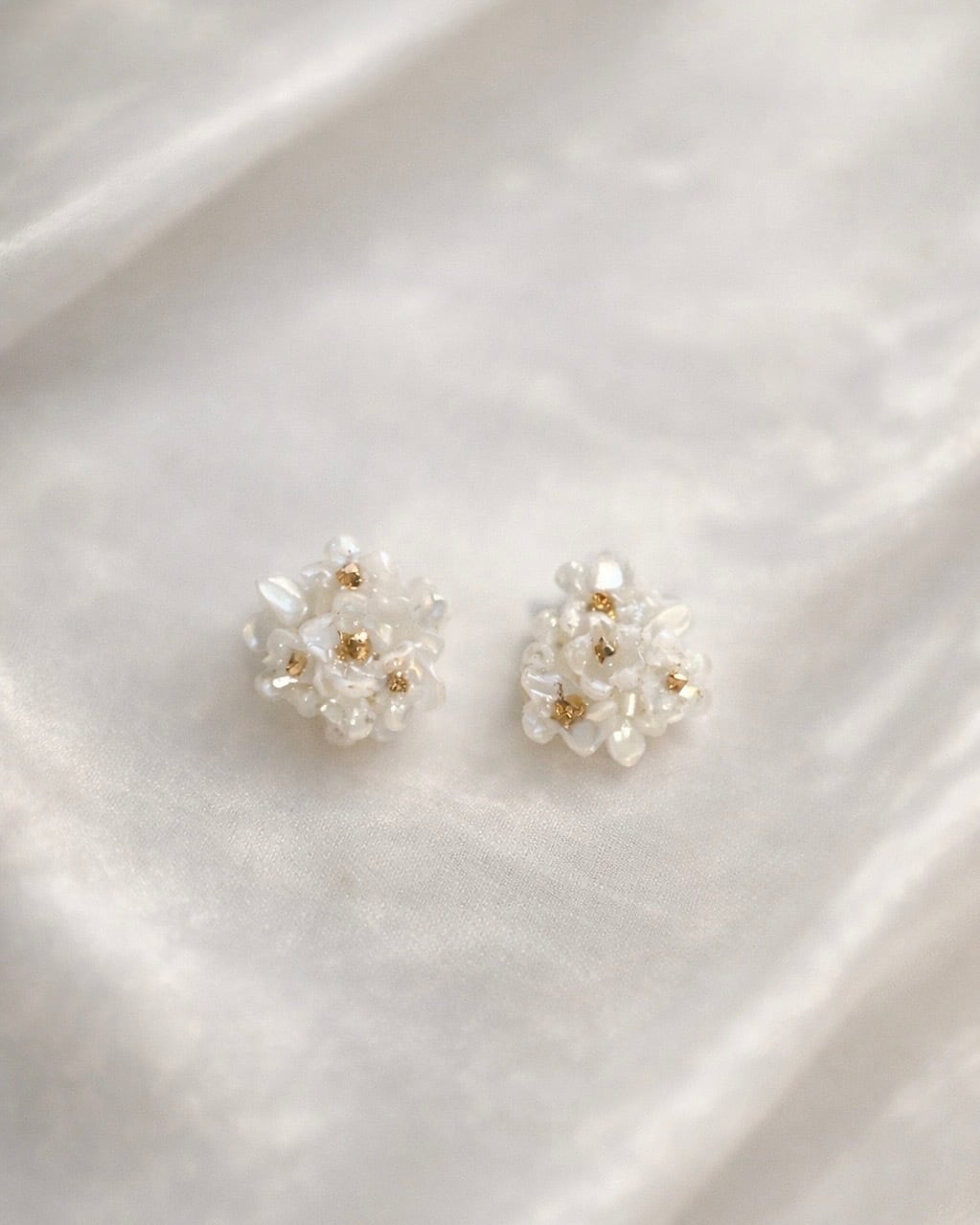 white seashell flowers pierce