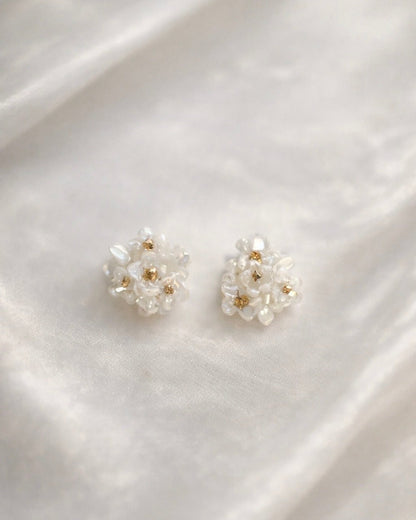 white seashell flowers pierce