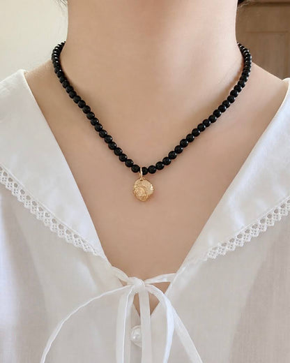 Seashell charm & Jet necklace