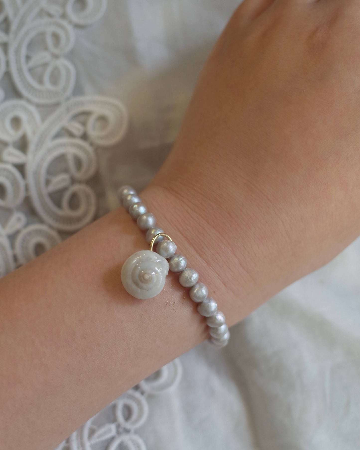 Pearl and seashell bracelet