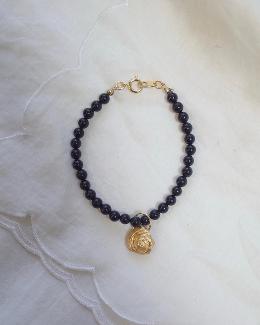 Armband aus weißem Schneckenleder