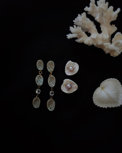 Piercing aus weißer Muschel