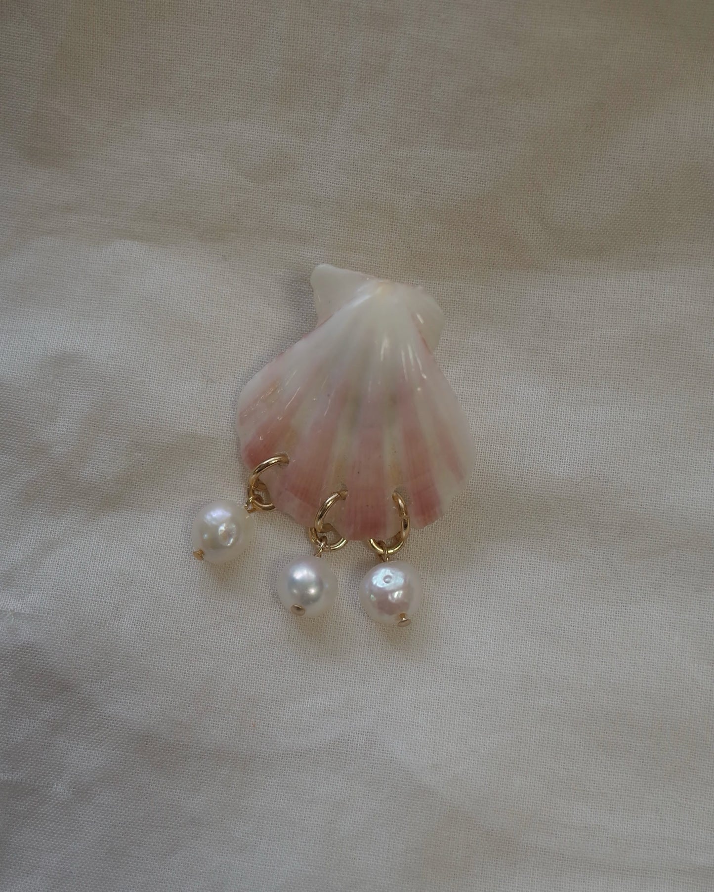 Pink seashell pierce